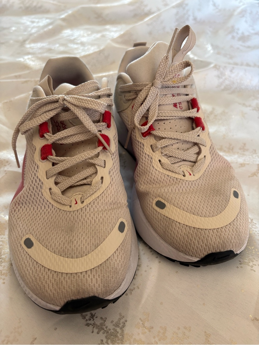 Nike womens Pink and Beige Mesh Sneakers